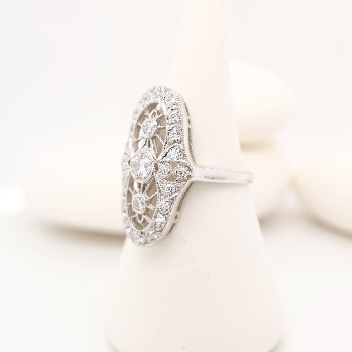 Cocktail halo ring with cubic zirconia in sterling silver