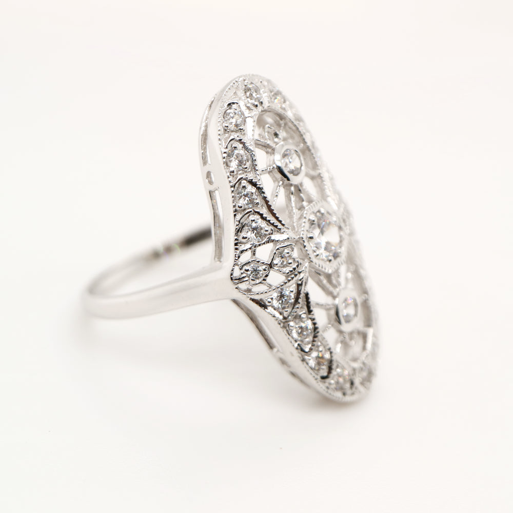Cocktail halo ring with cubic zirconia in sterling silver