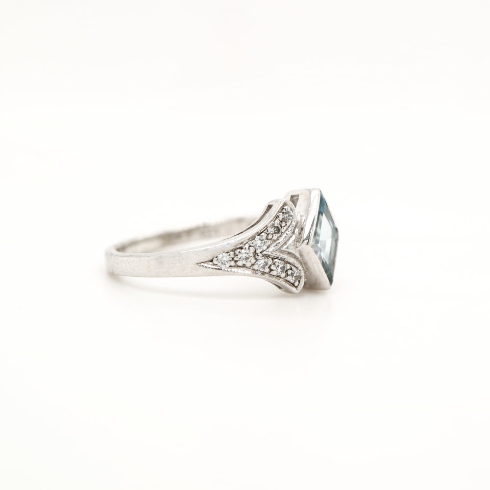 Diamond shape blue topaz with cz in sterling silver