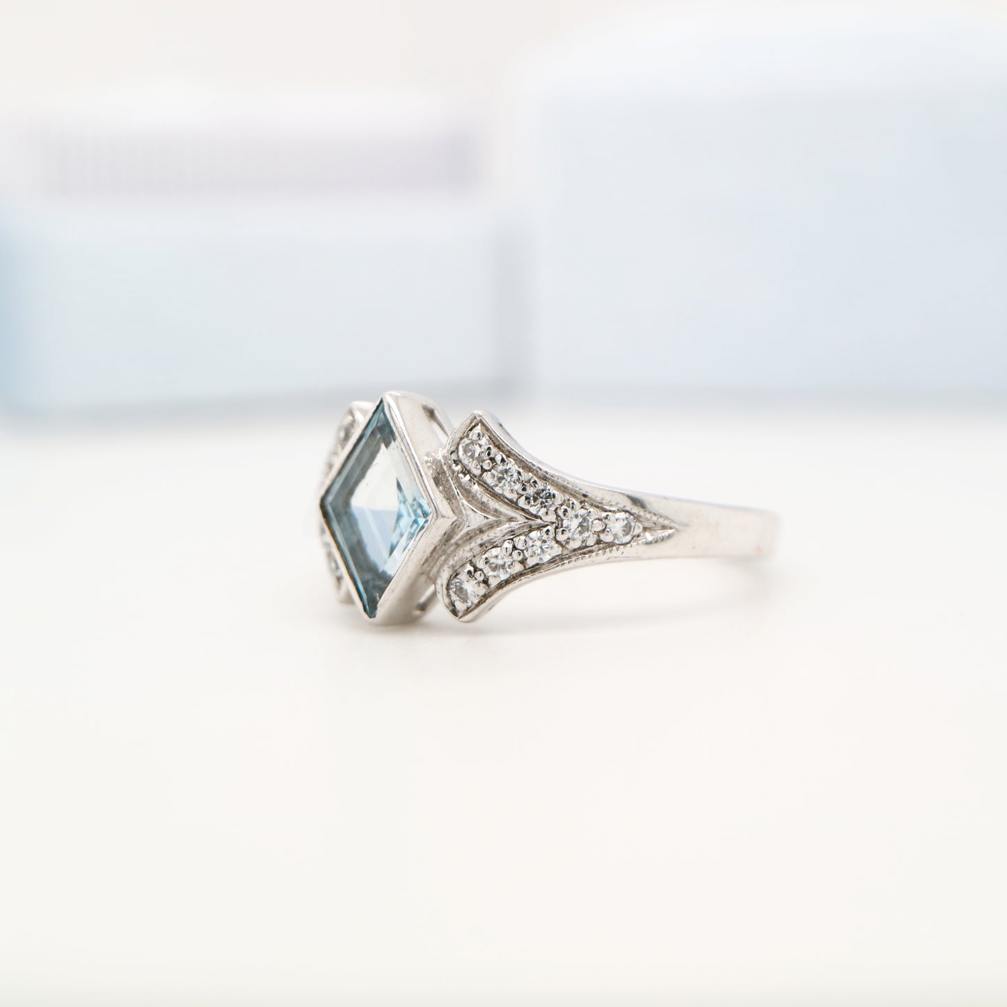 Diamond shape blue topaz with cz in sterling silver