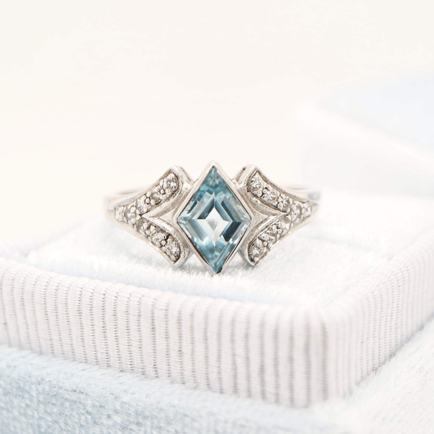 Diamond shape blue topaz with cz in sterling silver