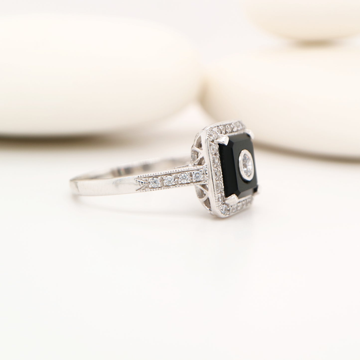Square art deco style diamond and black onyx ring in white gold