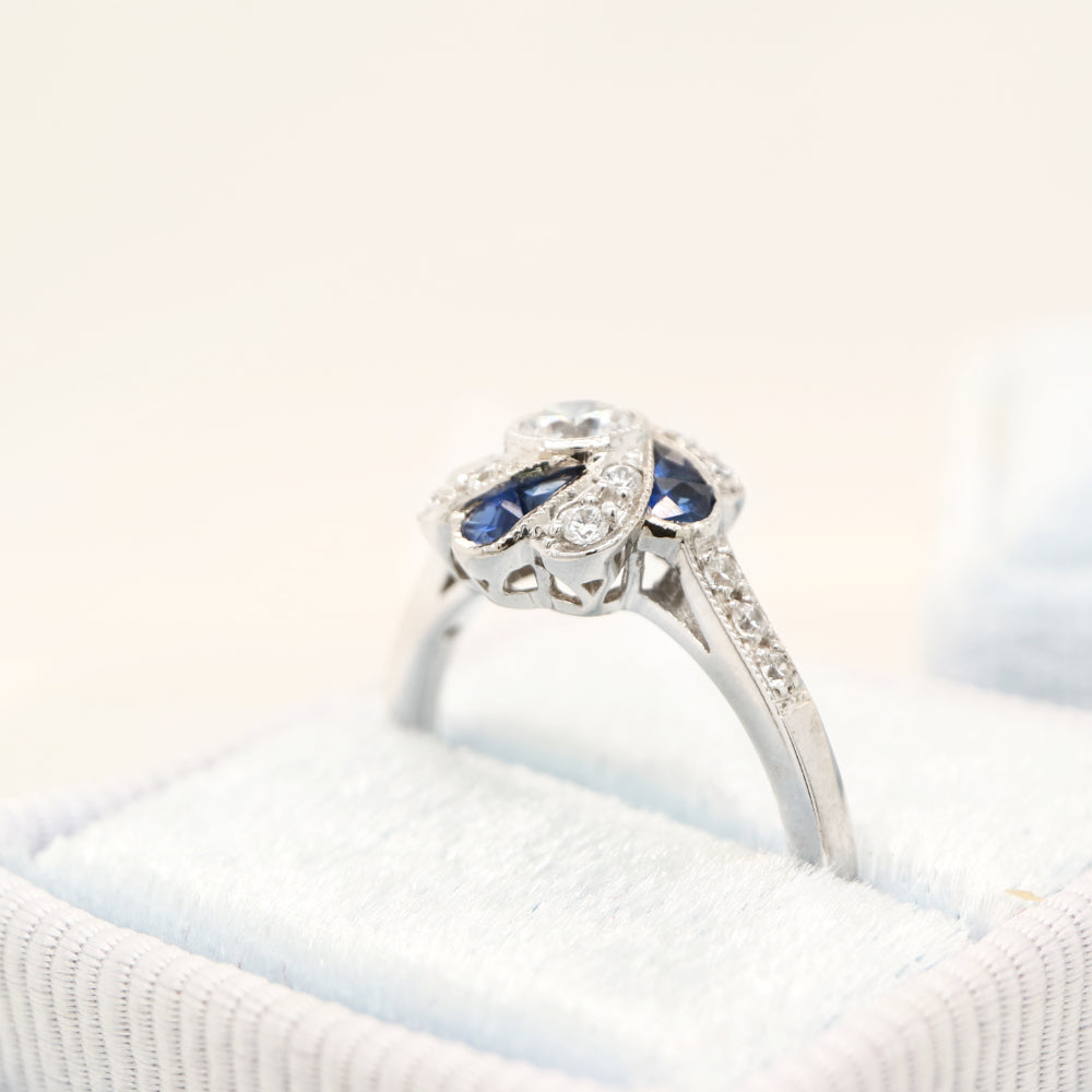 Vintage pinwheel white gold, sapphire and diamond ring