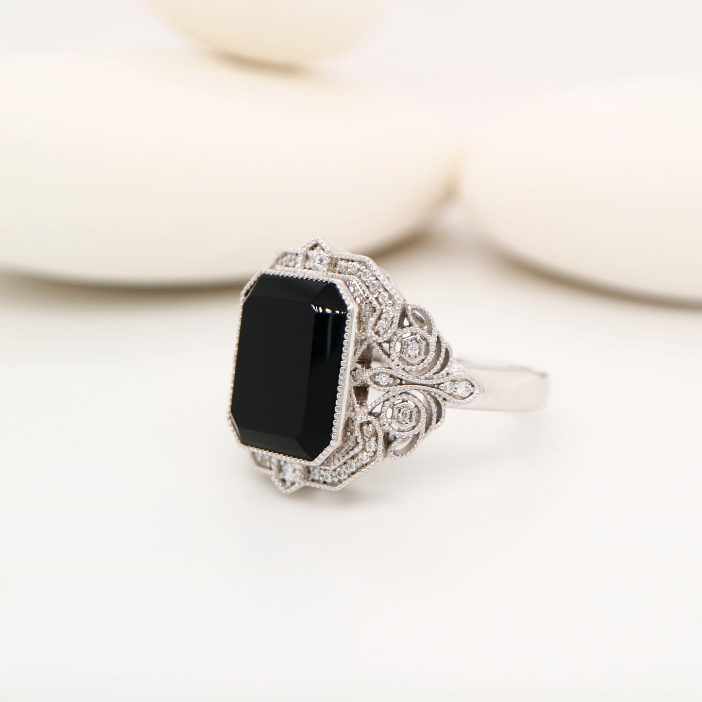 Onyx cocktail ring with diamonds in sterling silver