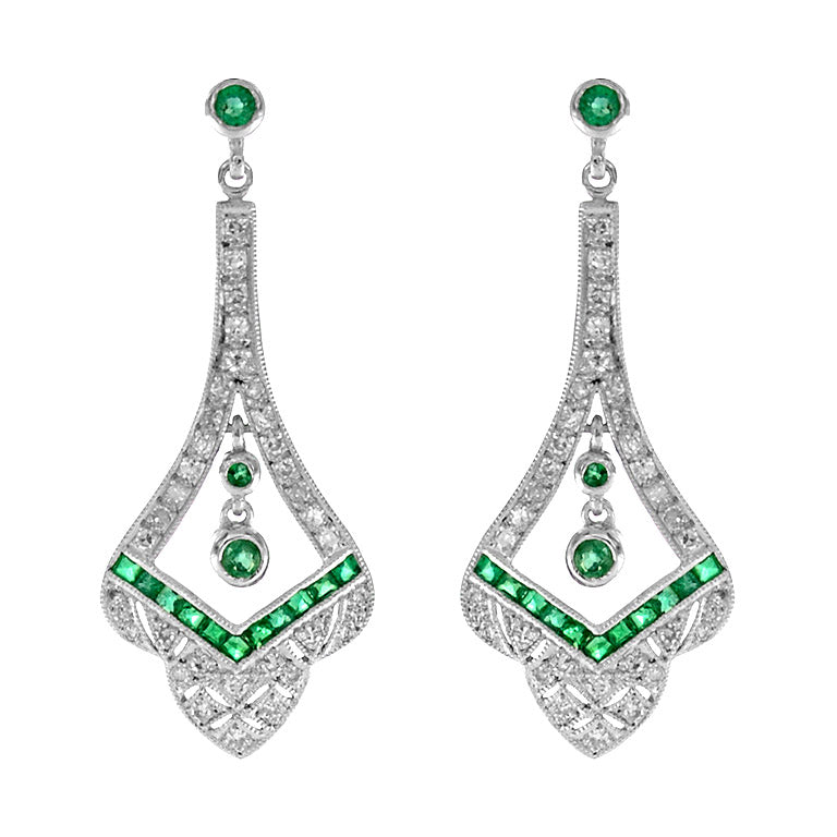 Edwardian chandelier earrings with channel set emeralds and diamonds