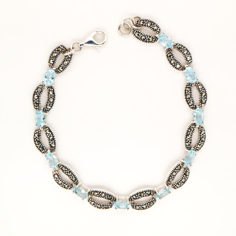Blue topaz and marcasite bracelet in sterling silver