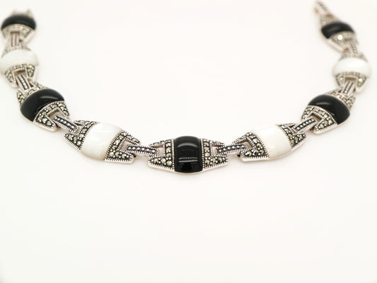 Onyx and mother of pearl art deco bracelet in sterling silver with marcasite
