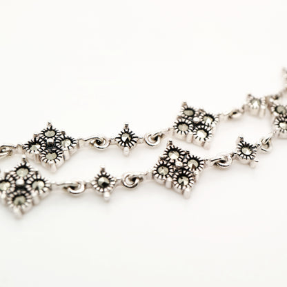 Marcasite bracelet with signature lozenge in sterling silver