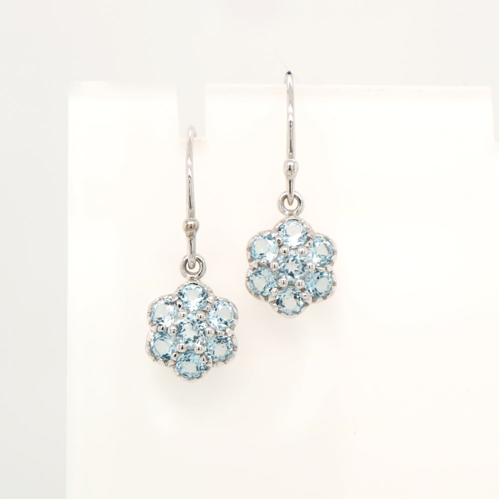 Daisy hook earrings with blue topaz in 9k White gold