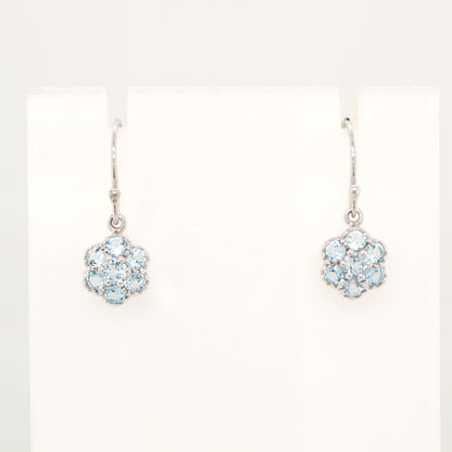 Daisy hook earrings with blue topaz in 9k White gold