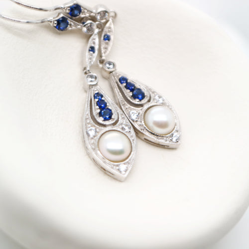 Dangle earrings with fresh water pearl, sapphire and diamond in 9k white gold