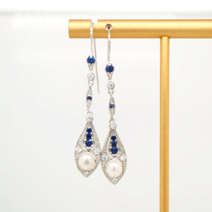 Dangle earrings with fresh water pearl, sapphire and diamond in 9k white gold