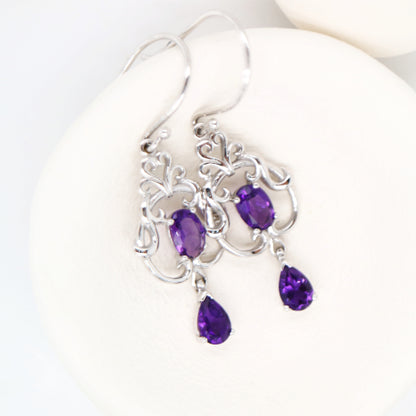 Art nouveau style earrings with amethyst in 9k white gold