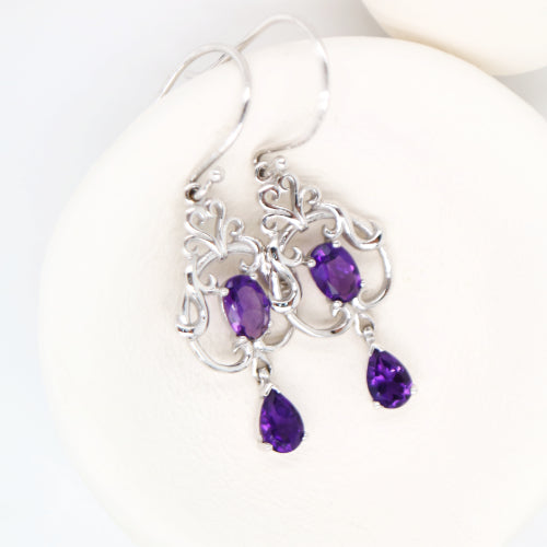 Art nouveau style earrings with amethyst in 9k white gold
