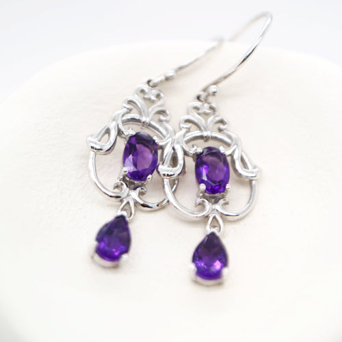 Art nouveau style earrings with amethyst in 9k white gold