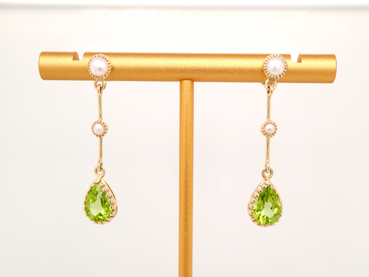 Freshwater pearl with peridot drop earrings in 9k yellow gold