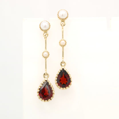 Freshwater pearl with garnet drop earrings in 9k yellow gold