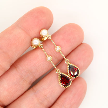 Freshwater pearl with garnet drop earrings in 9k yellow gold