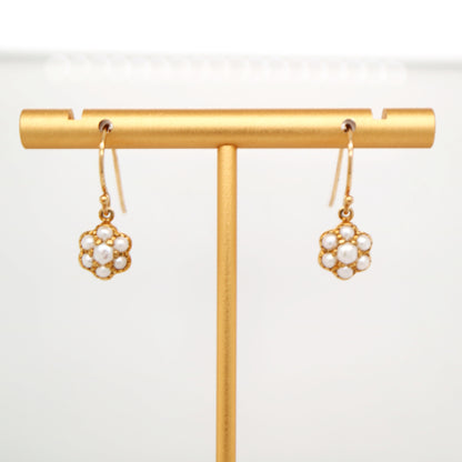 Daisy hook earrings with freshwater pearls in 9k yellow gold