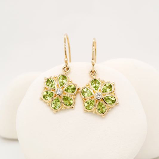 Peridot petal flower earrings with natural diamond in 9k yellow gold