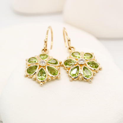Peridot petal flower earrings with natural diamond in 9k yellow gold