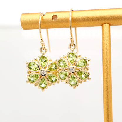 Peridot petal flower earrings with natural diamond in 9k yellow gold