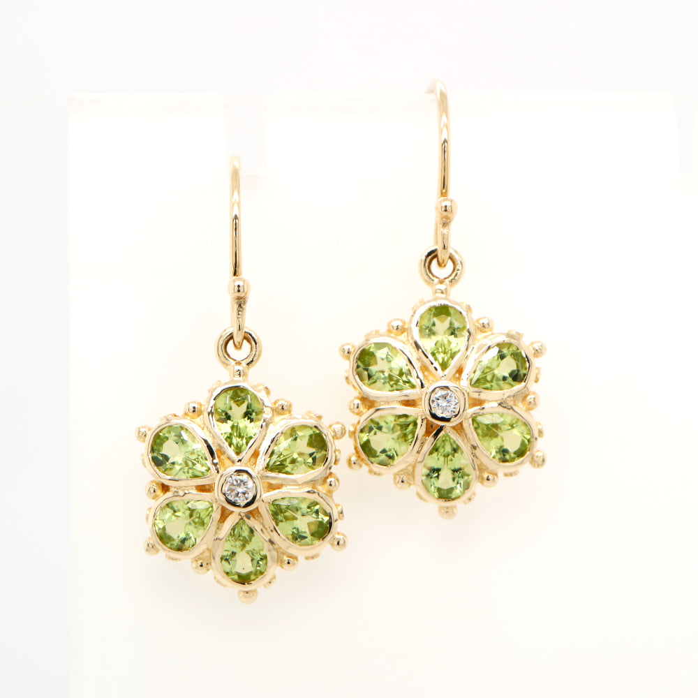 Peridot petal flower earrings with natural diamond in 9k yellow gold