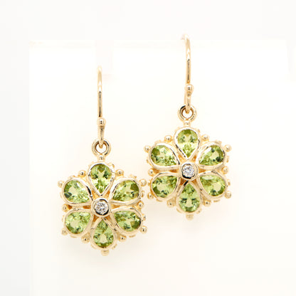 Peridot petal flower earrings with natural diamond in 9k yellow gold