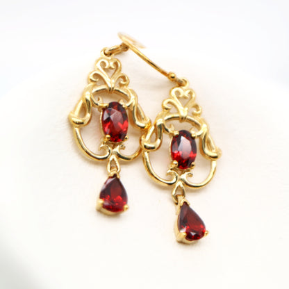 Art nouveau style earrings with garnet in 9k yellow gold
