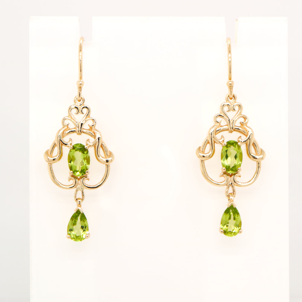 Art nouveau style earrings with peridot in 9k yellow gold