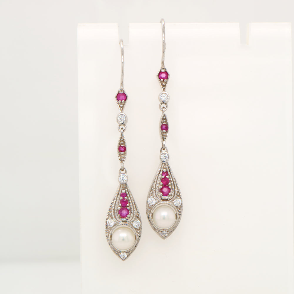 Dangle earrings with fresh water pearl, ruby and diamond in 9k white gold