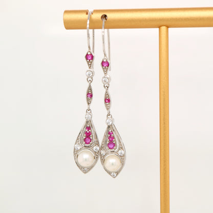 Dangle earrings with fresh water pearl, ruby and diamond in 9k white gold