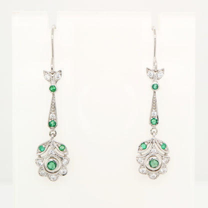 Floral drop earrings with laboratory grown emerald and cz in sterling silver
