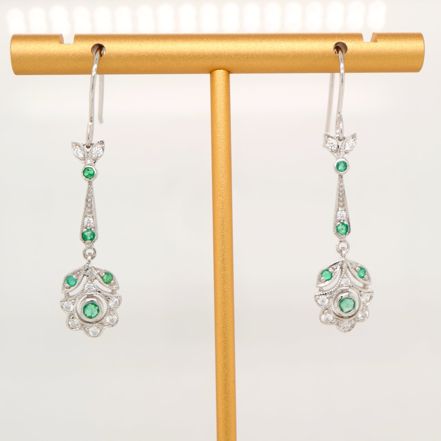 Floral drop earrings with laboratory grown emerald and cz in sterling silver