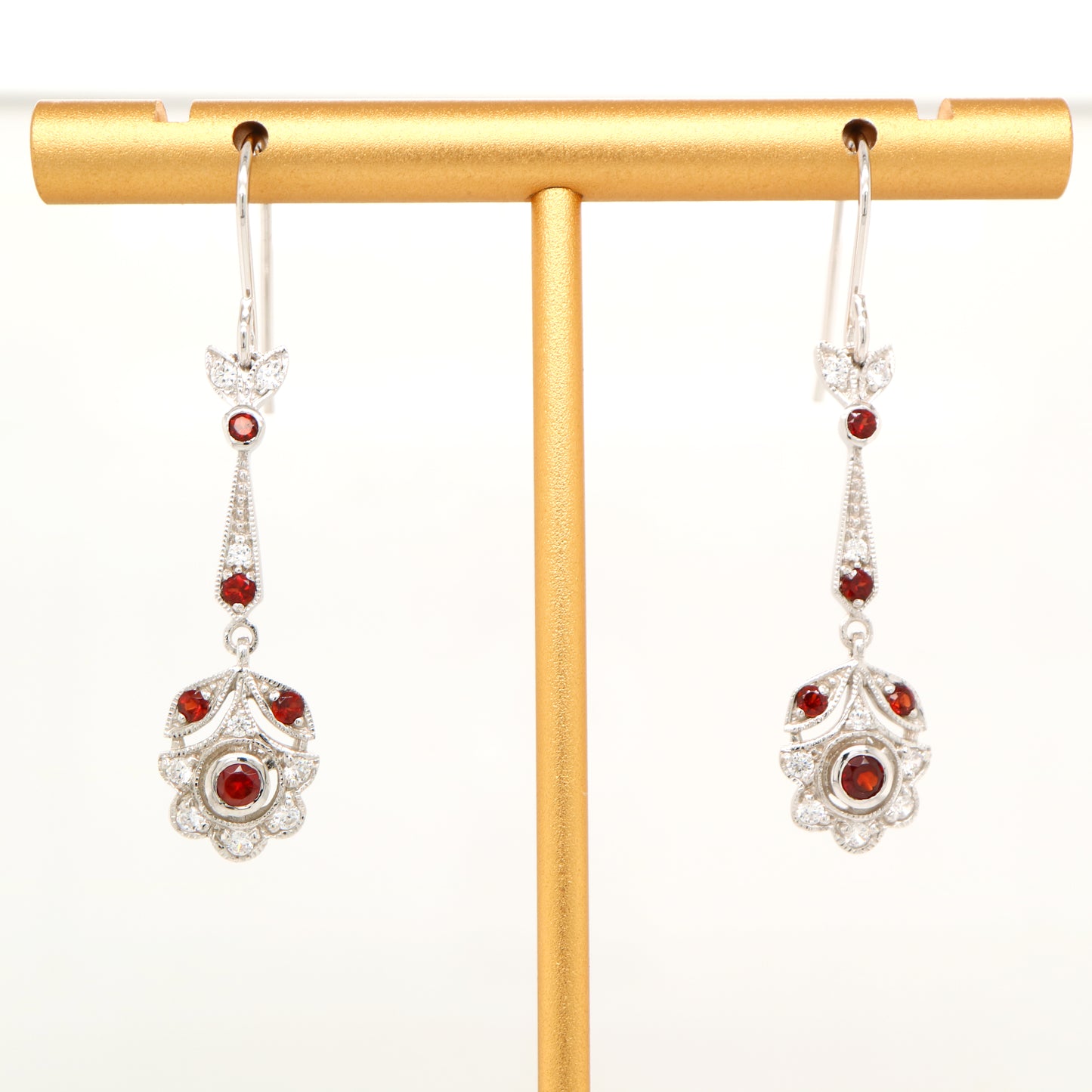Floral drop earrings with laboratory grown ruby and cz in sterling silver