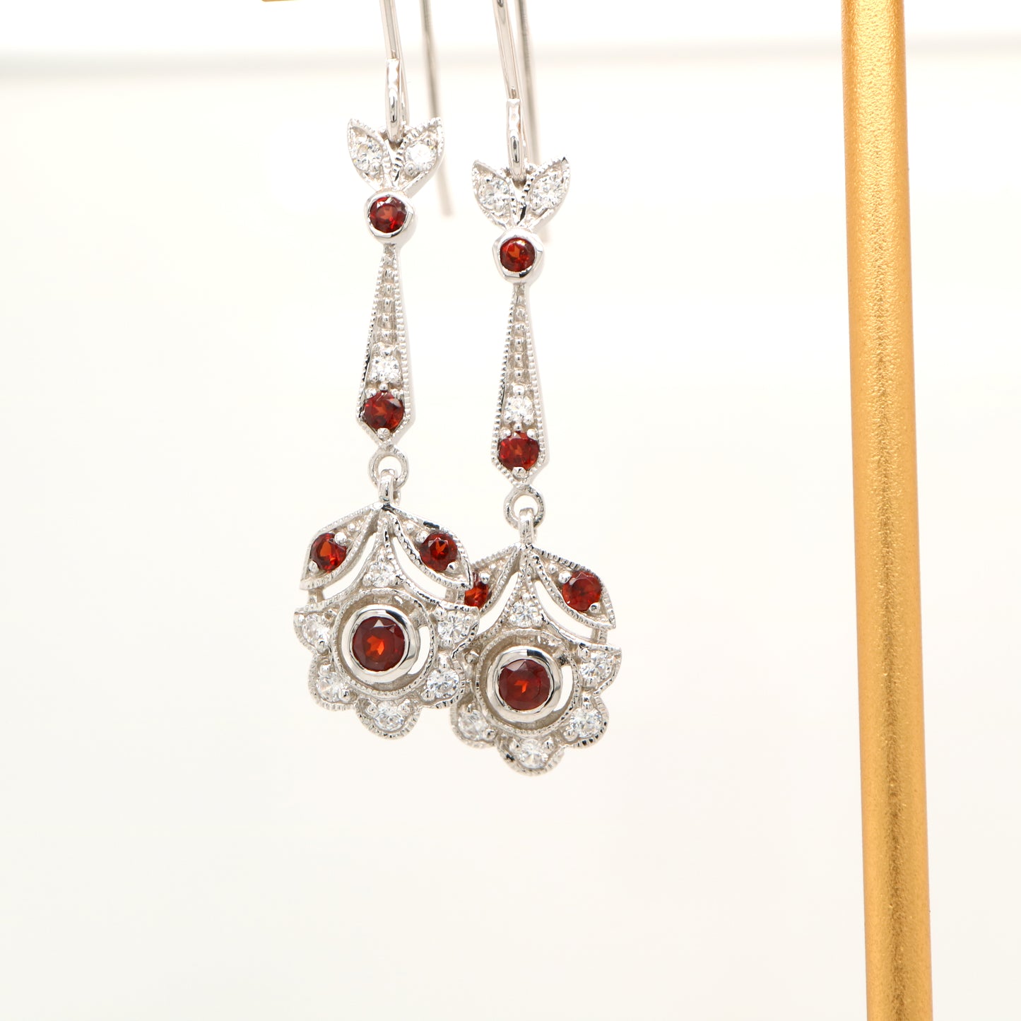 Floral drop earrings with laboratory grown ruby and cz in sterling silver