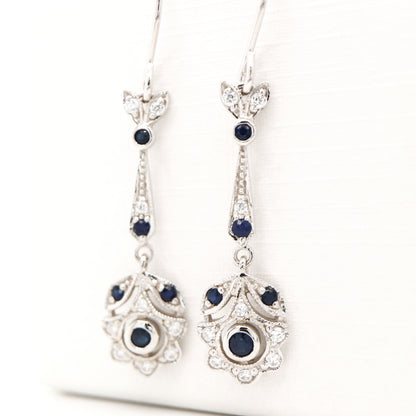 Floral drop earrings with laboratory grown blue sapphire and cz in sterling silver
