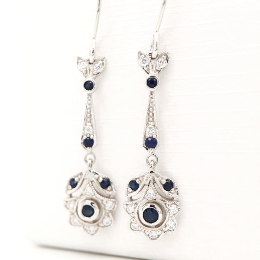 Floral drop earrings with laboratory grown blue sapphire and cz in sterling silver