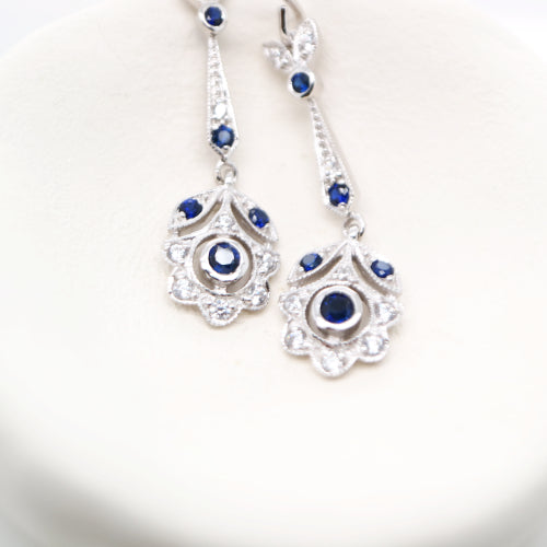 Floral drop earrings with laboratory grown blue sapphire and cz in sterling silver
