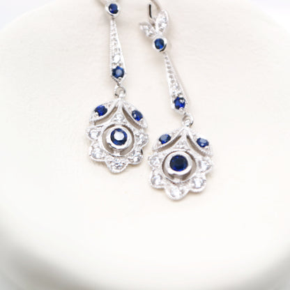 Floral drop earrings with laboratory grown blue sapphire and cz in sterling silver