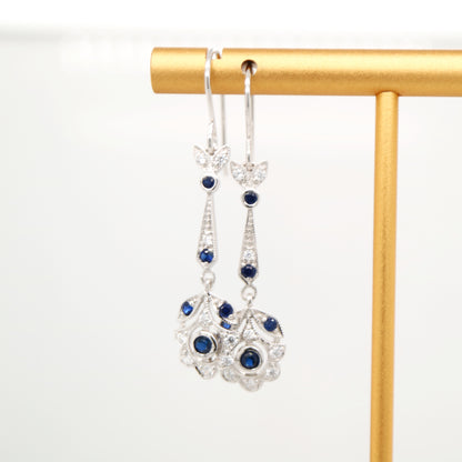 Floral drop earrings with laboratory grown blue sapphire and cz in sterling silver