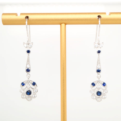 Floral drop earrings with laboratory grown blue sapphire and cz in sterling silver