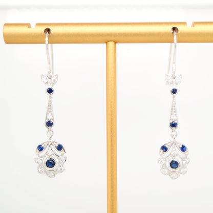 Floral drop earrings with laboratory grown blue sapphire and cz in sterling silver