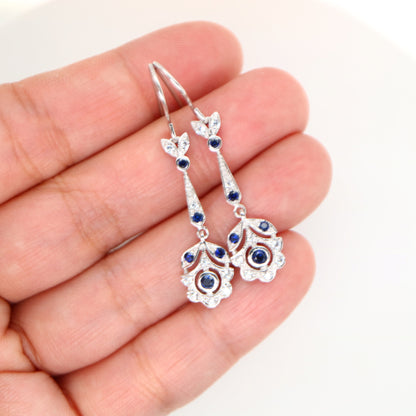 Floral drop earrings with laboratory grown blue sapphire and cz in sterling silver