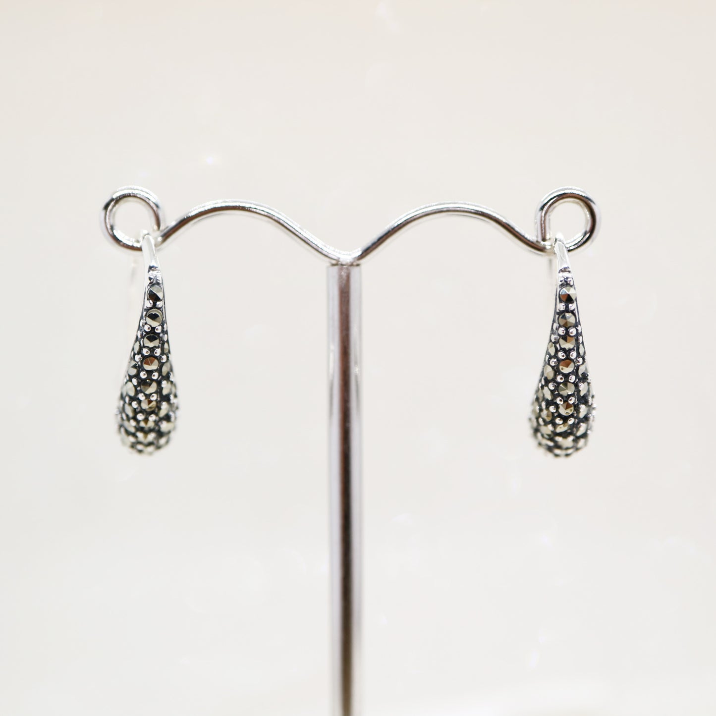 Curve hook style earrings with marcasite in sterling silver