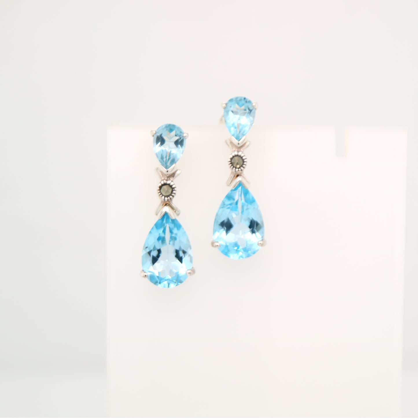 Blue topaz drop earrings in Sterling Silver