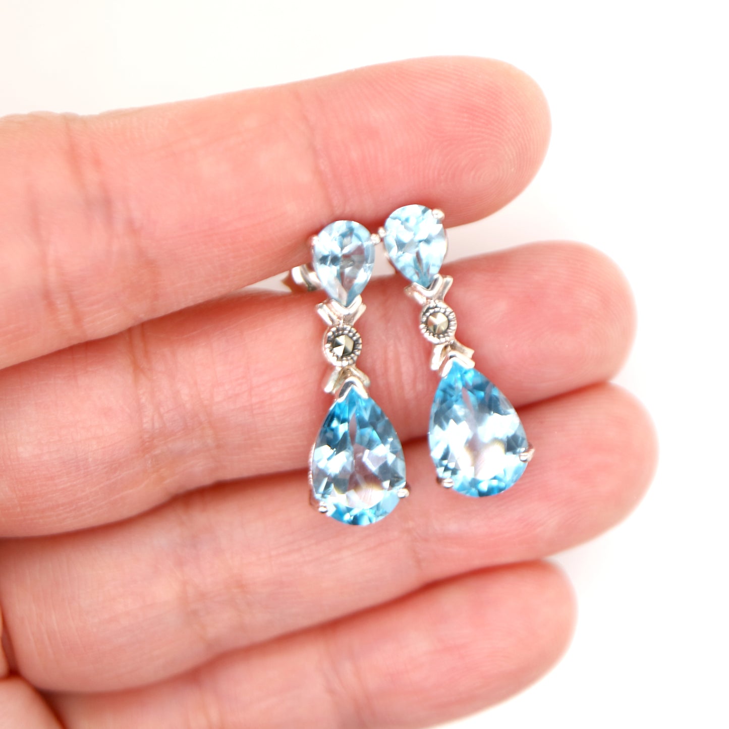 Blue topaz drop earrings in Sterling Silver