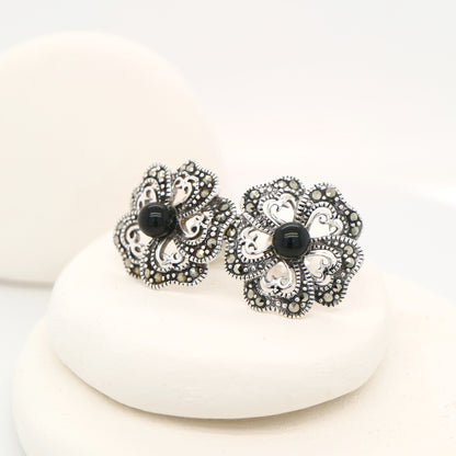 5 petal flower stud earrings with marcasite and onyx in sterling silver