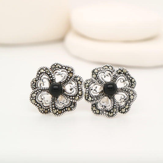 5 petal flower stud earrings with marcasite and onyx in sterling silver