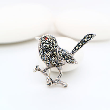 Fairywren marcasite brooch in sterling silver with garnet eye